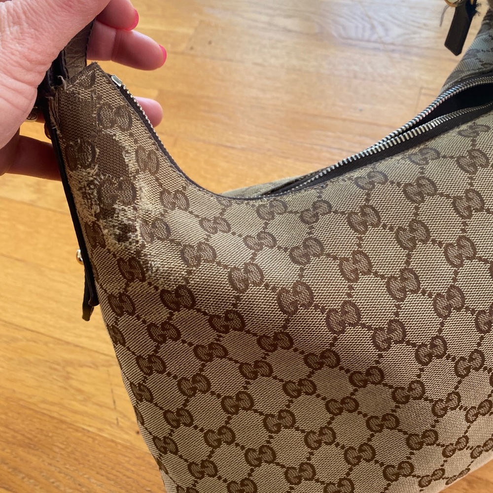 Gucci bag authentic with leather handle bar